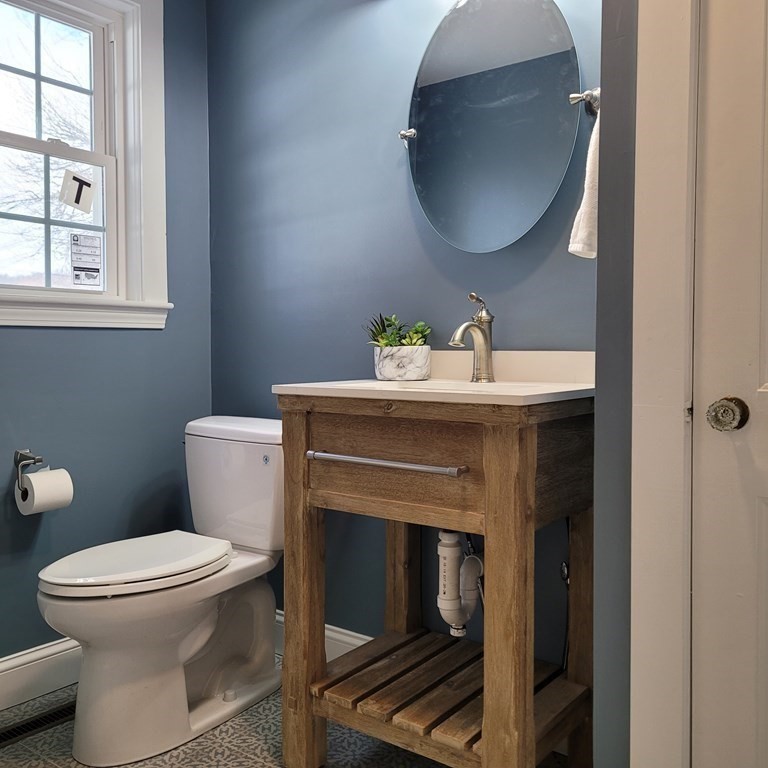 114 Conant Street Danvers, MA 01923 - Photo 20 of 29 a bathroom with a toilet and a sink