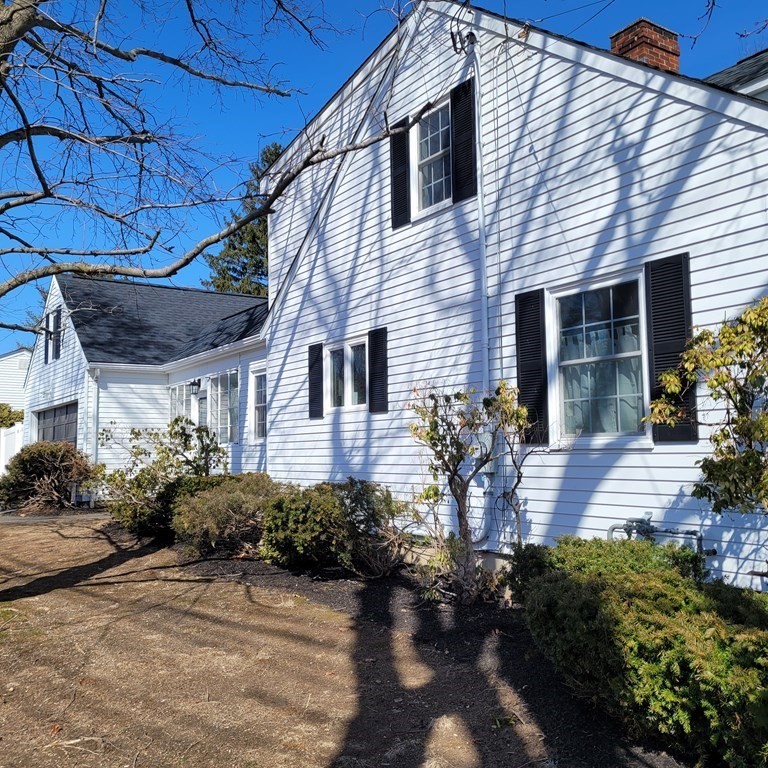114 Conant Street Danvers, MA 01923 - Photo 2 of 29 a front view of a house with garden