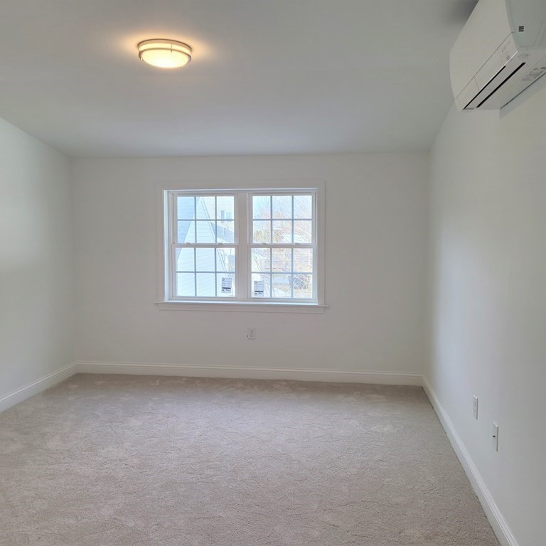 114 Conant Street Danvers, MA 01923 - Photo 24 of 29 an empty room with a window