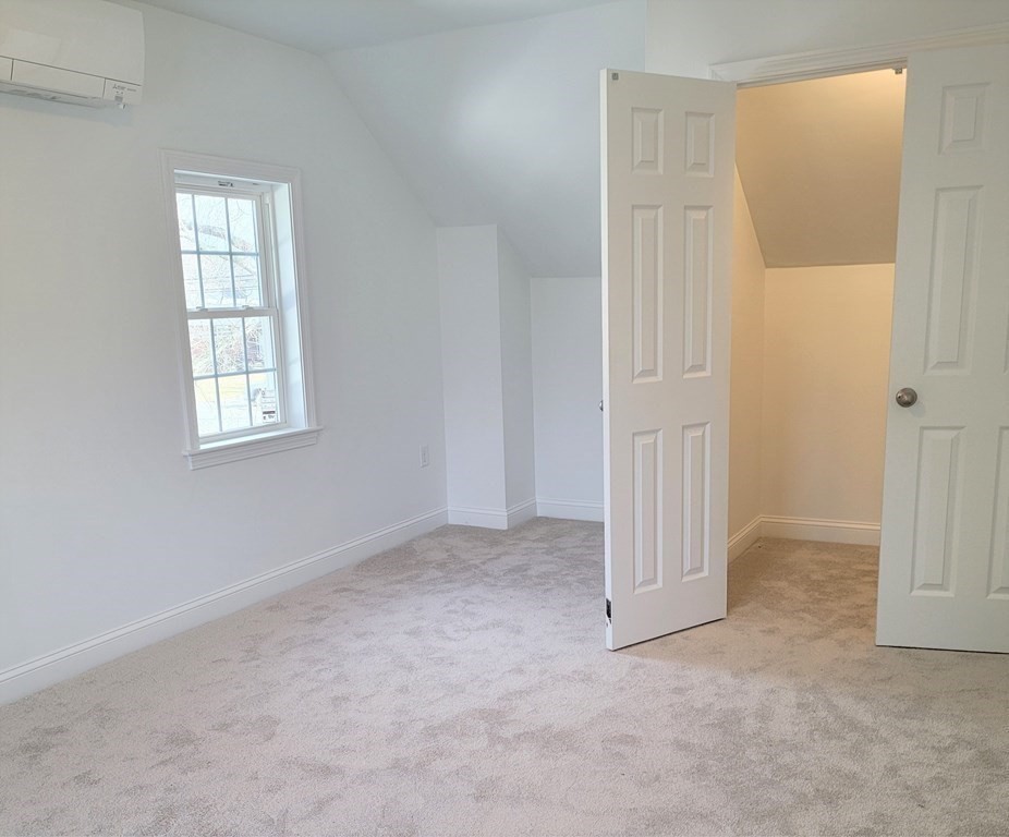 114 Conant Street Danvers, MA 01923 - Photo 25 of 29 an empty room with windows