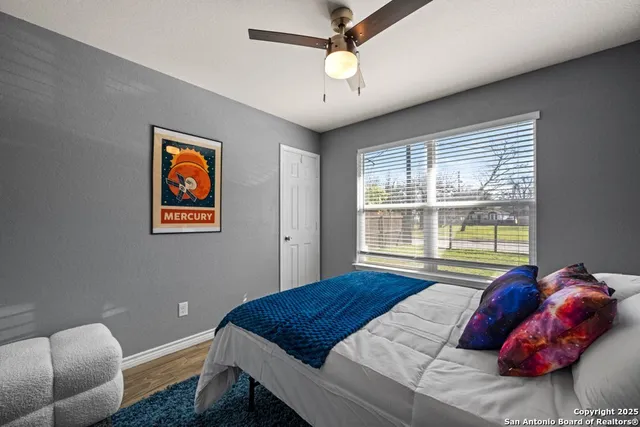 a bed room with a bed and a couch