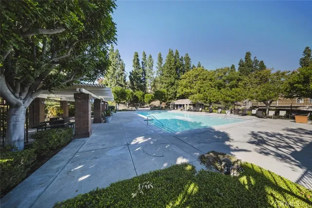 a view of a street with houses on both side