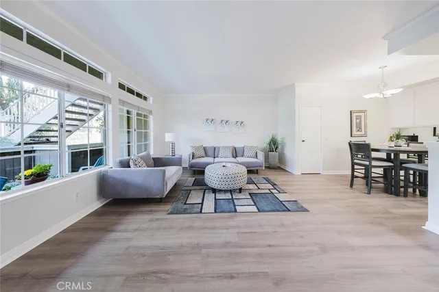 a living room with furniture and a table