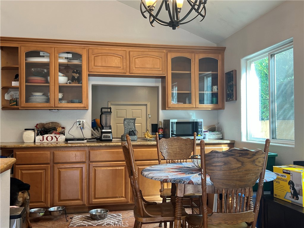 426 West 1st Street Azusa, CA 91702 - Photo 8 of 21 a view of a dining room with furniture window and outside view