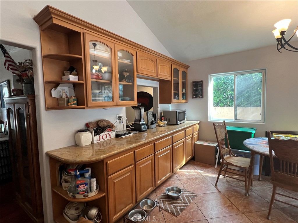 426 West 1st Street Azusa, CA 91702 - Photo 9 of 21 a kitchen with a sink cabinets and appliances