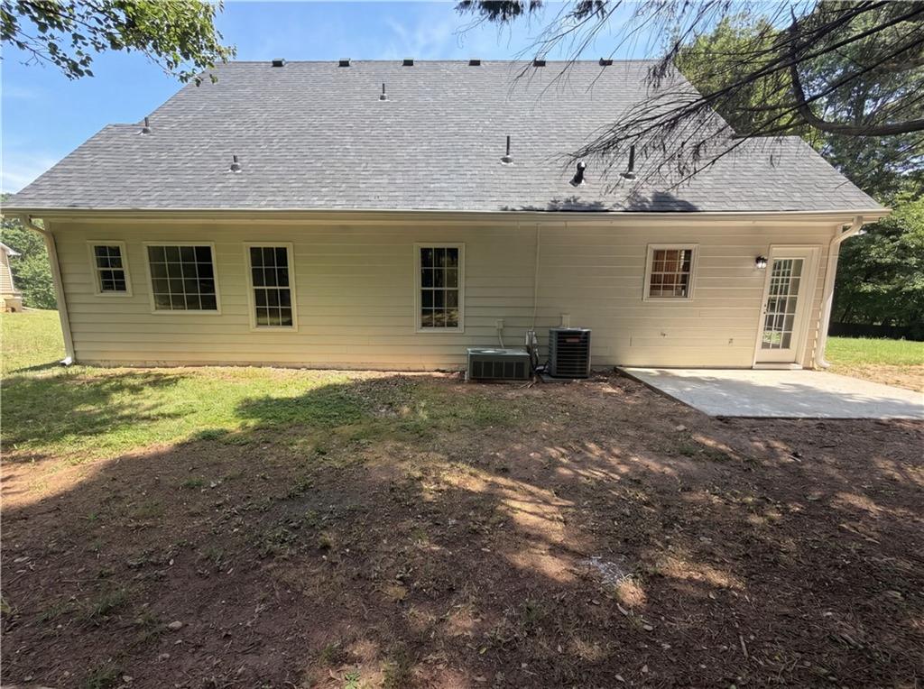 722 Ridgetop Road Bethlehem, GA 30620 - Photo 22 of 23 a front view of a house with a yard
