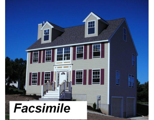 8 Erlin Road Chelmsford, MA 01824 - Photo 1 of 1 a front view of residential houses with street