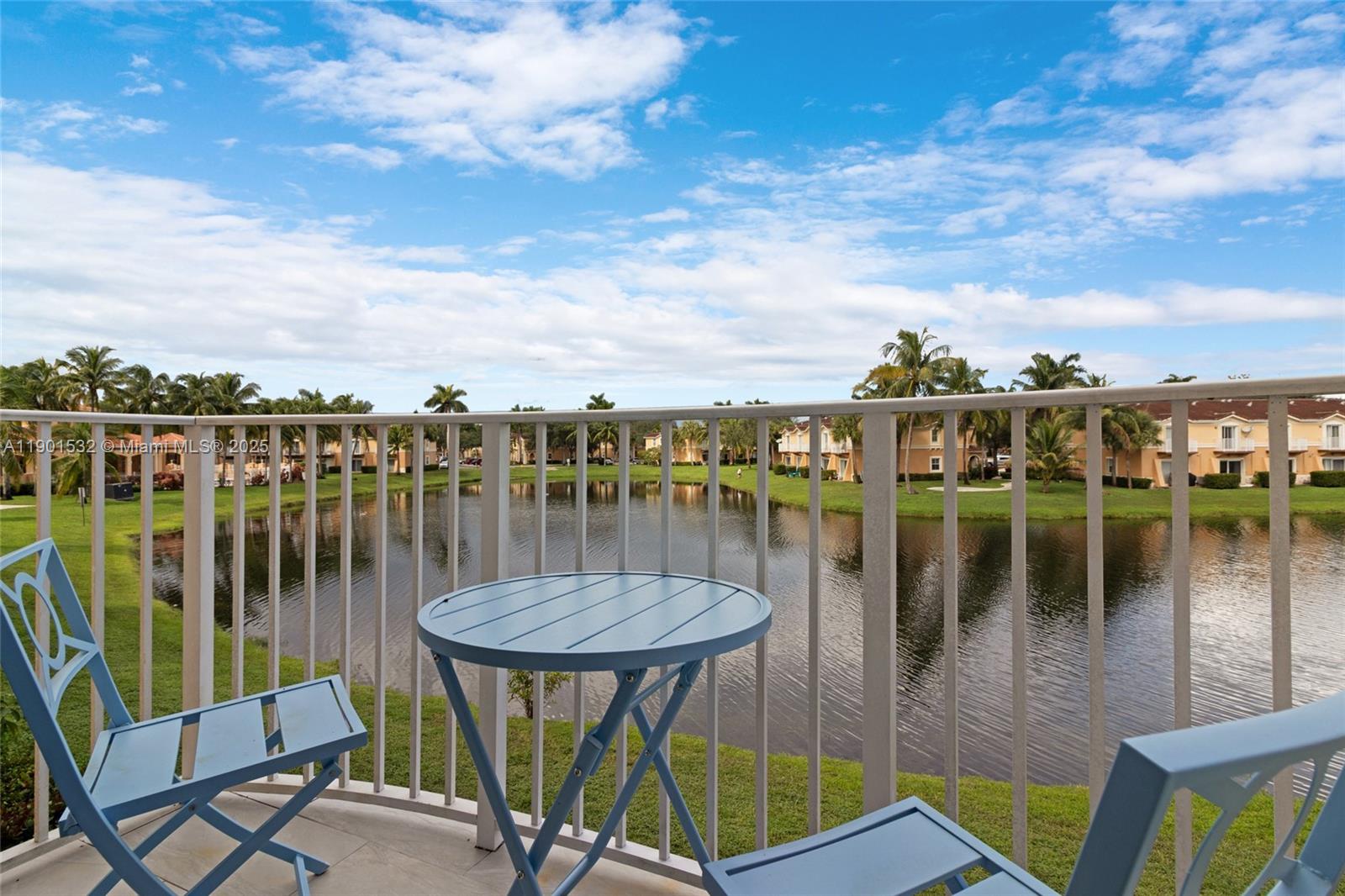 12905 Southwest 31st Court Miramar, FL 33027 - Photo 24 of 48 a view of a lake from a balcony with furniture