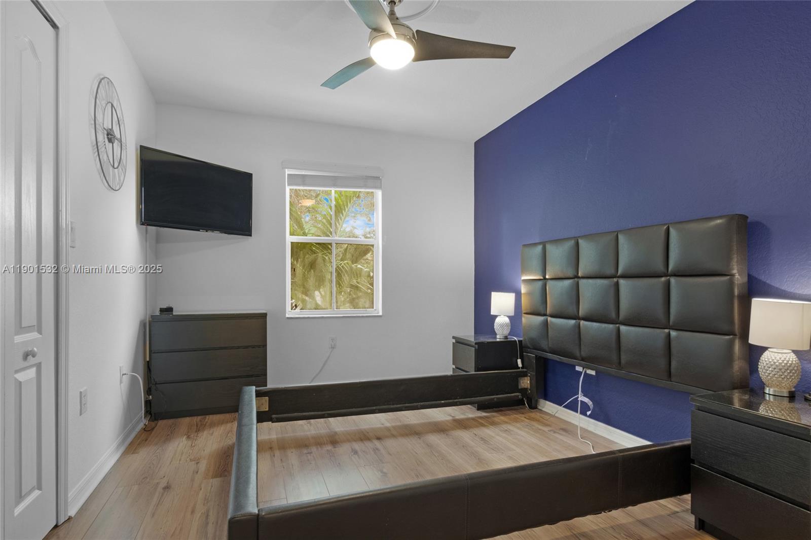 12905 Southwest 31st Court Miramar, FL 33027 - Photo 26 of 48 a bedroom with furniture and a window