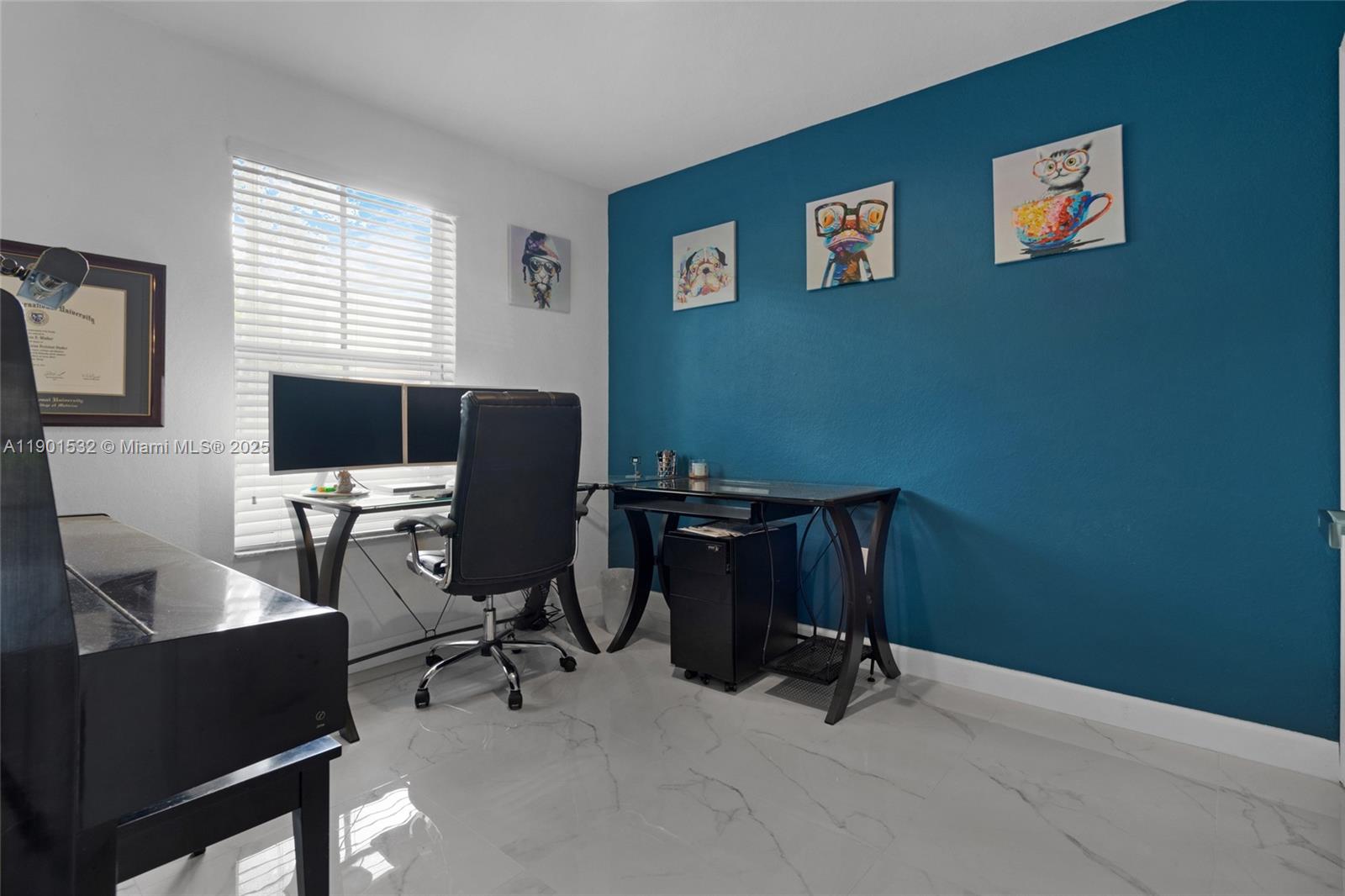 12905 Southwest 31st Court Miramar, FL 33027 - Photo 30 of 48 a view of a workspace with furniture and a window