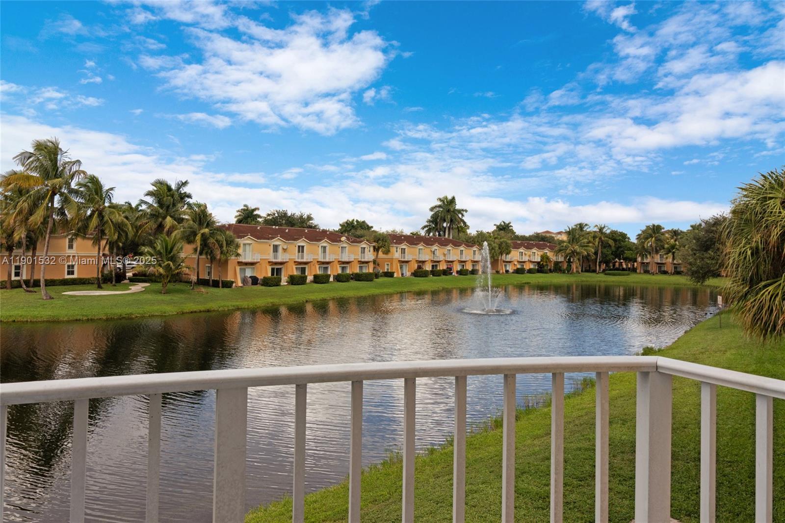 12905 Southwest 31st Court Miramar, FL 33027 - Photo 36 of 48 a view of a lake with houses in the background