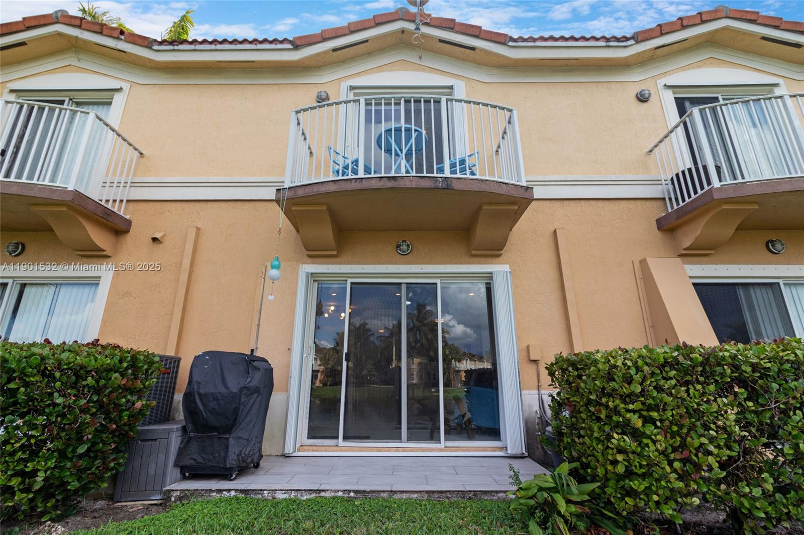 12905 Southwest 31st Court Miramar, FL 33027 - Photo 37 of 48 a front view of a house with garden
