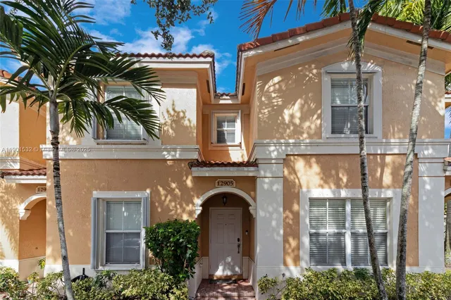 front view of a house with a balcony