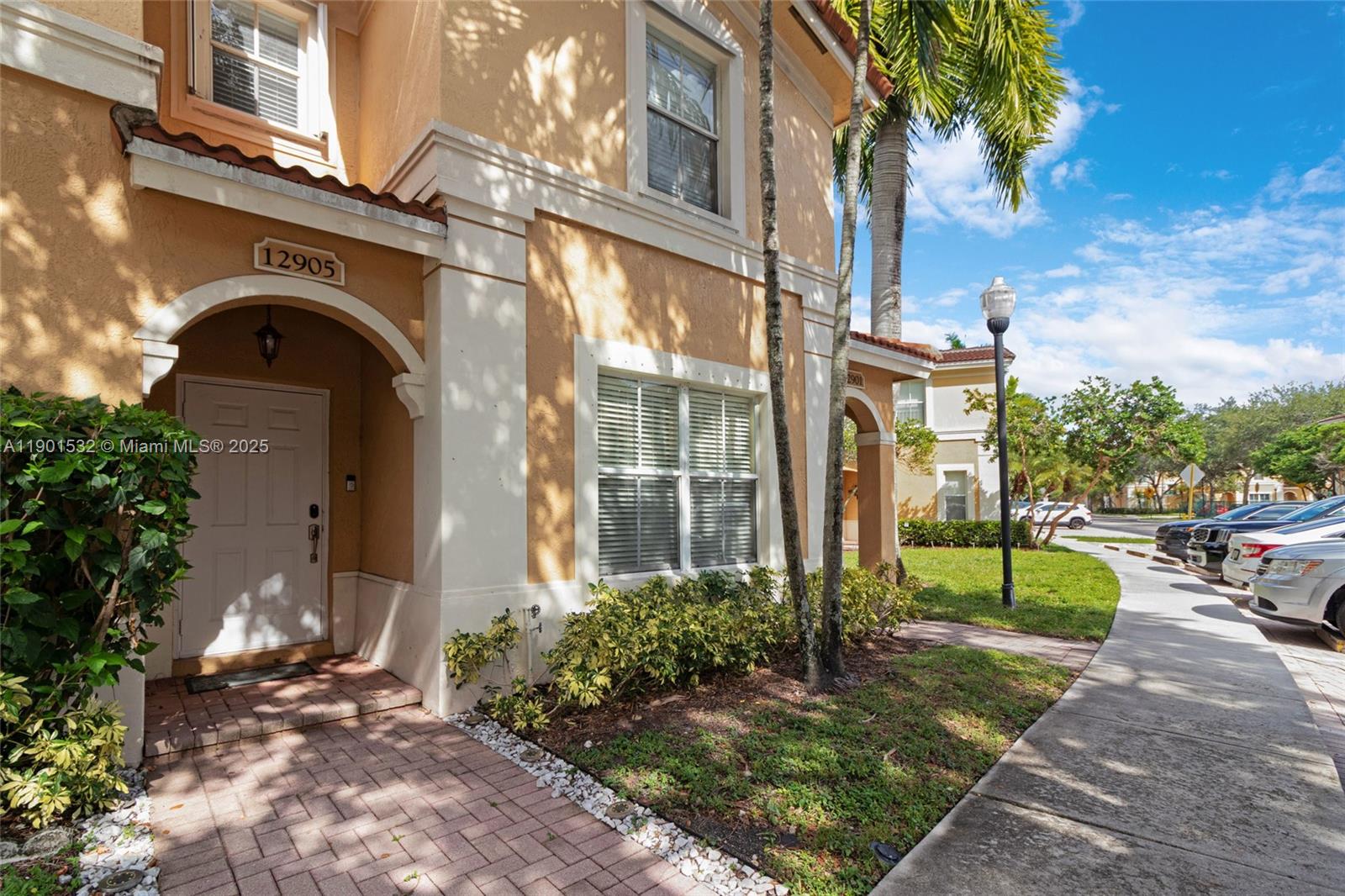12905 Southwest 31st Court Miramar, FL 33027 - Photo 41 of 48 a house view with a outdoor space