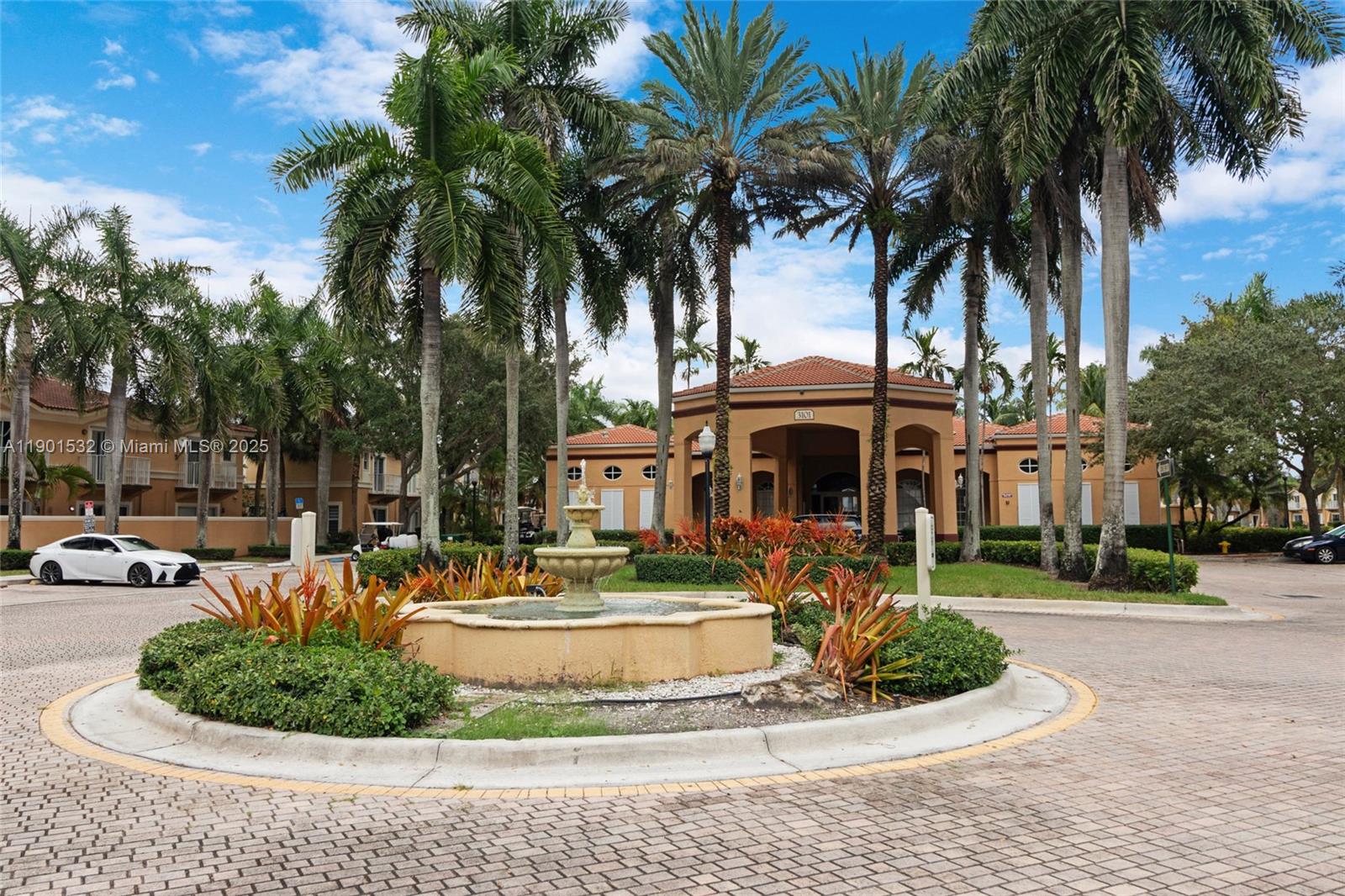 12905 Southwest 31st Court Miramar, FL 33027 - Photo 43 of 48 a front view of a house with a garden and swimming pool