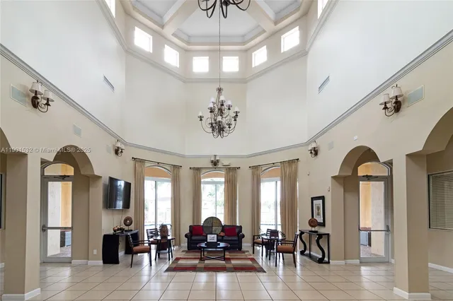 a view of a livingroom with furniture window and wooden floor