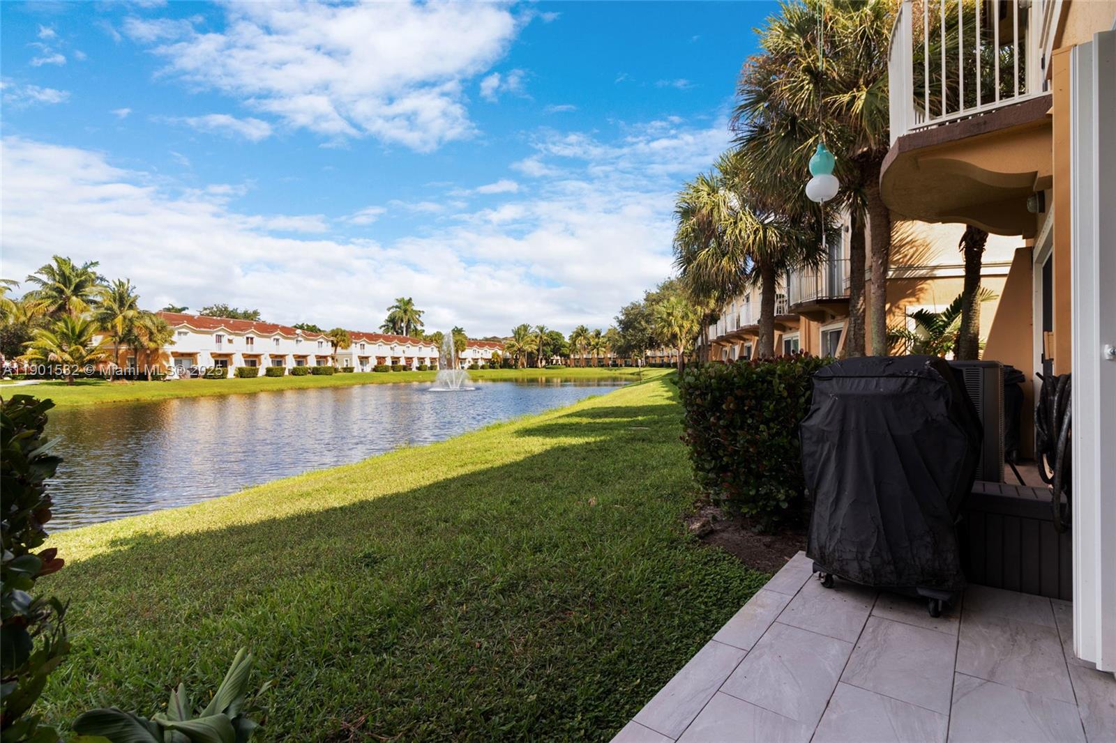 12905 Southwest 31st Court Miramar, FL 33027 - Photo 10 of 48 a view of a lake with houses in the back