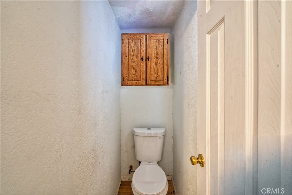 700 South Shafter, Unit 20 Shafter, CA 93263 - Photo 11 of 18 a bathroom with a toilet and a sink