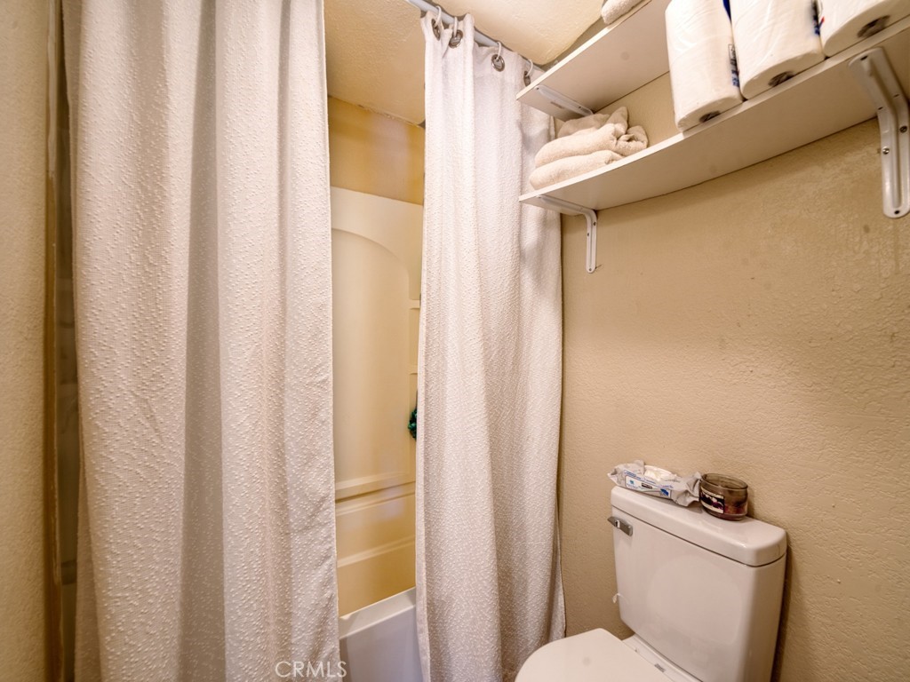 700 South Shafter, Unit 20 Shafter, CA 93263 - Photo 13 of 18 a bathroom with a sink and toilet