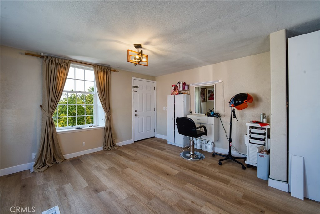 700 South Shafter, Unit 20 Shafter, CA 93263 - Photo 3 of 18 a view of a workspace with furniture and a window