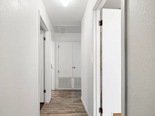 a view of a bathroom from the hallway