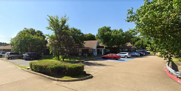 a view of street with parked cars