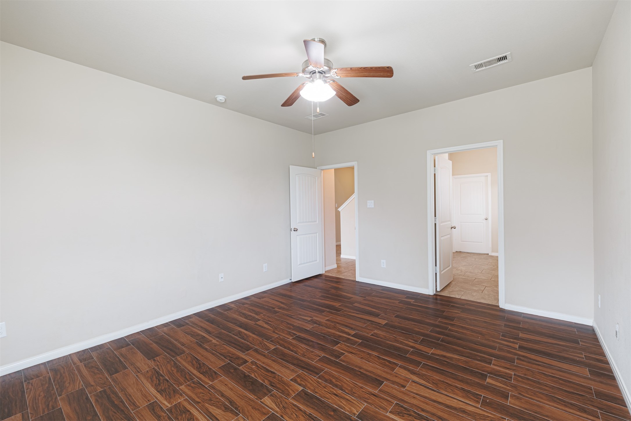 25322 Saddlebrook Ranch Drive Tomball, TX 77375 - Photo 10 of 20 wooden floor in an empty room