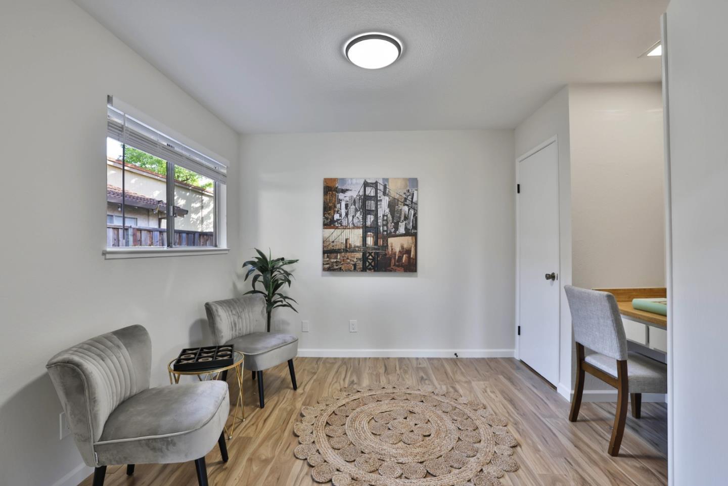 4648 Cherry Avenue San Jose, CA 95118 - Photo 19 of 29 a living room with furniture and a rug