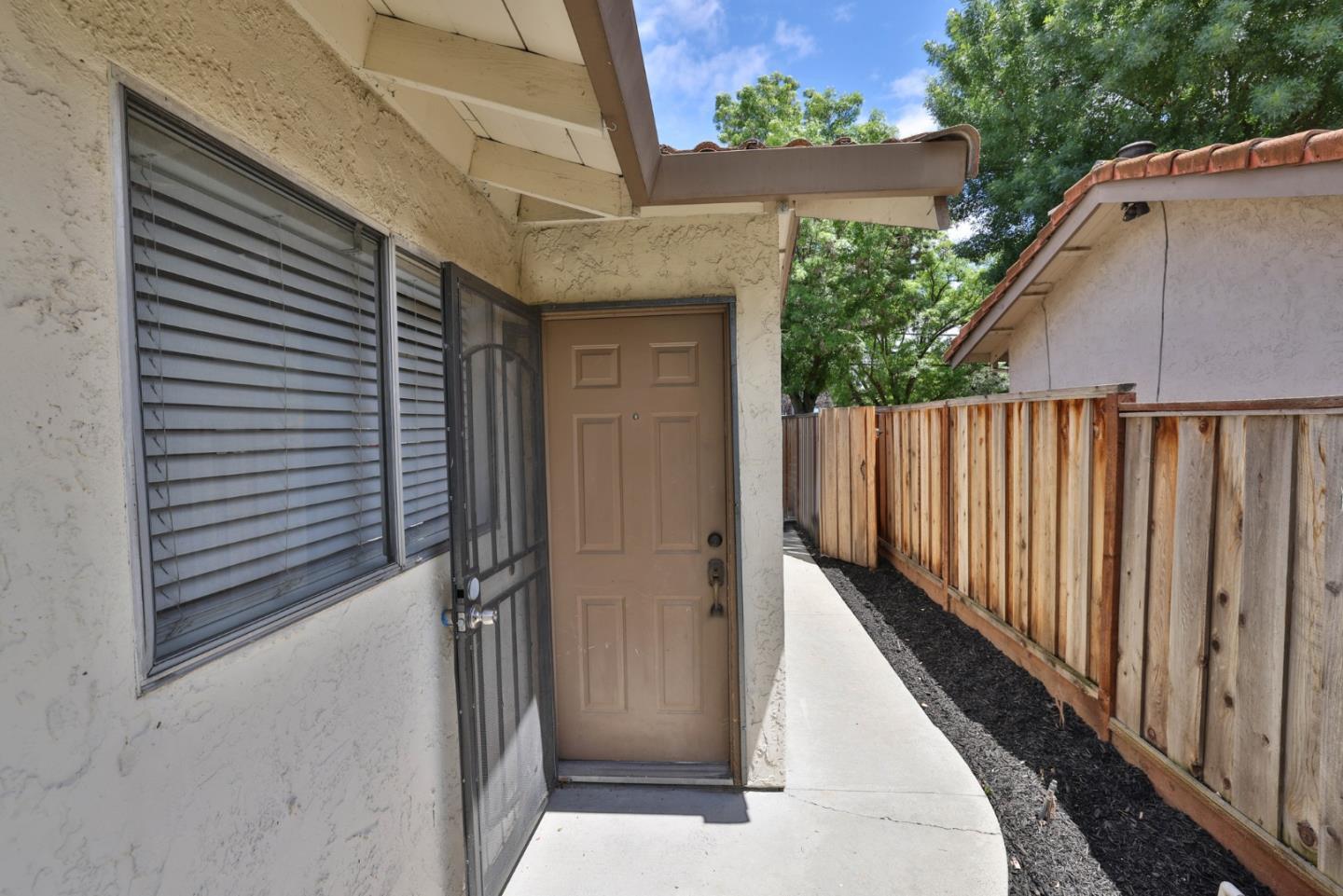 4648 Cherry Avenue San Jose, CA 95118 - Photo 3 of 29 a view of a house with a backyard