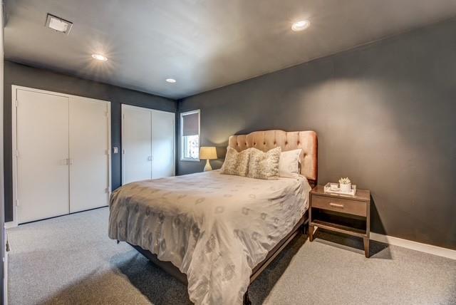 4122 Travis Street, Unit 2 Dallas, TX 75204 - Photo 12 of 19 a bedroom with a bed and a shower