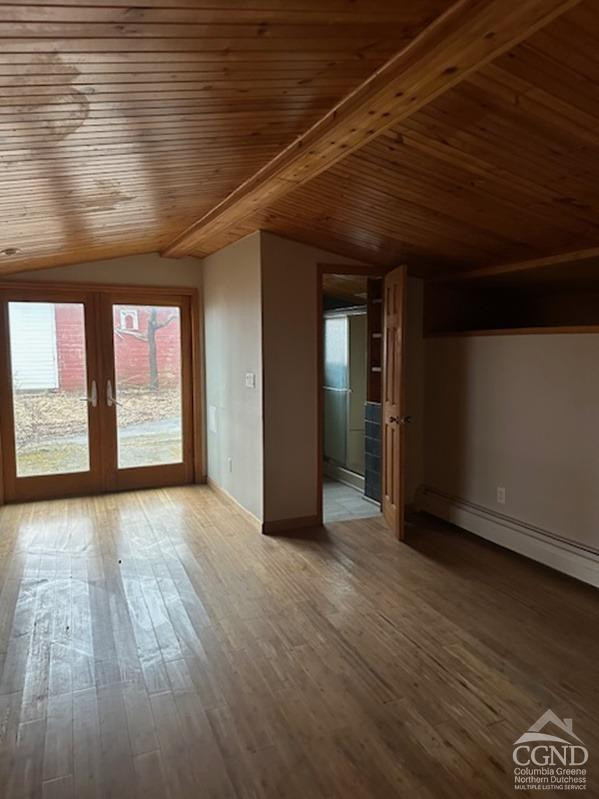 124 Plattekill Road Greenville, NY 12083 - Photo 12 of 14 wooden floor in an empty room with a window