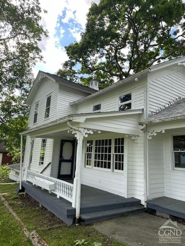 124 Plattekill Road Greenville, NY 12083 - Photo 9 of 14 a view of house with a yard and sitting area