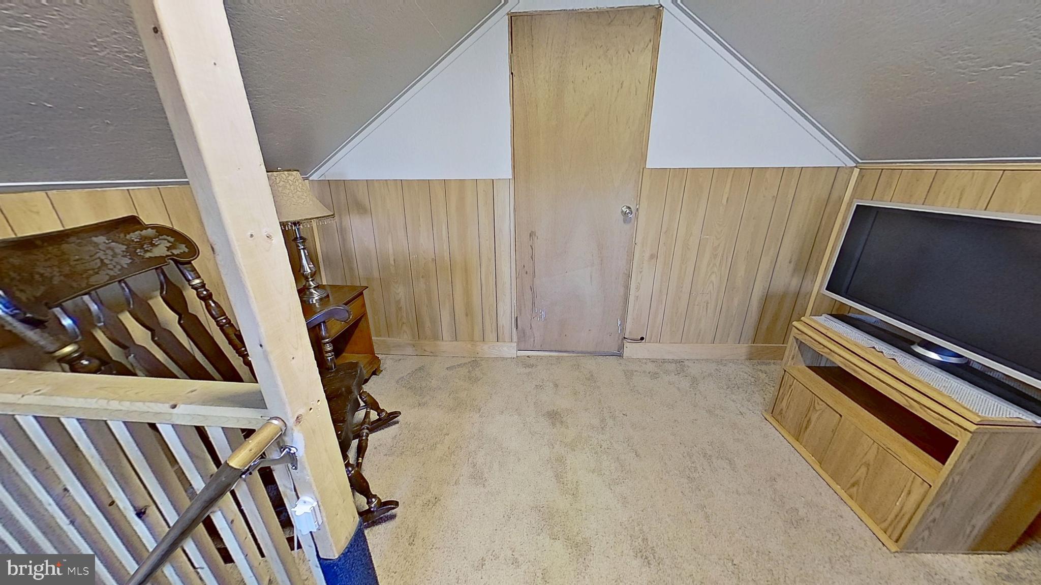 181 Cemetery Street Littlestown, PA 17340 - Photo 9 of 10 a view of an empty room with wooden floor