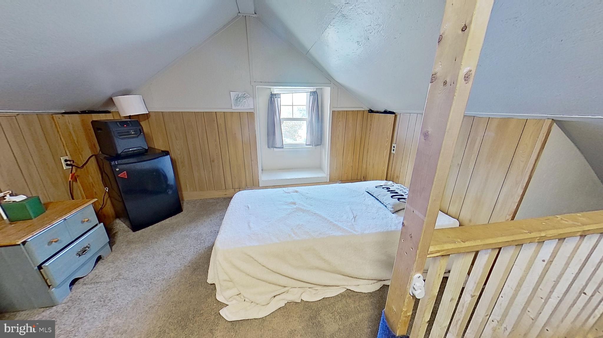 181 Cemetery Street Littlestown, PA 17340 - Photo 10 of 10 a bedroom with a bed and wooden floor