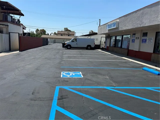 a living room with a couch and dresser