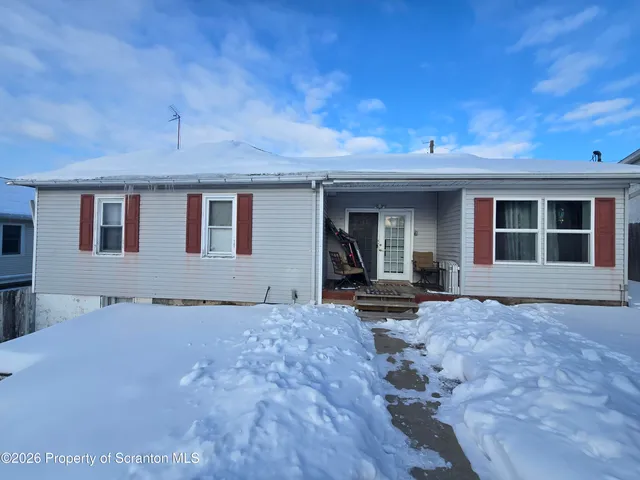 a view of a house with a patio