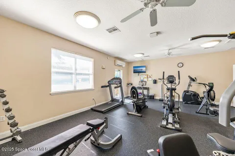 a gym room with gym equipment