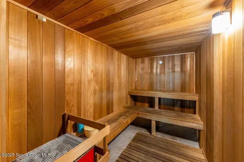 a bedroom with bunk bed and a window