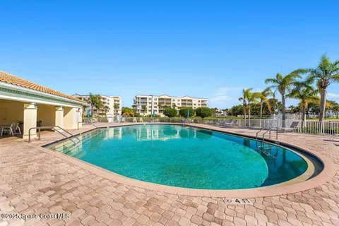 a view of a swimming pool from a terrace