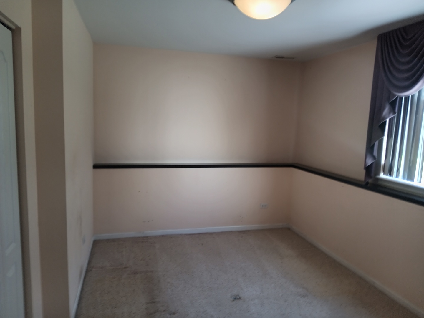 410 Highland Road Matteson, IL 60443 - Photo 15 of 27 a view of a room with racks on the wall