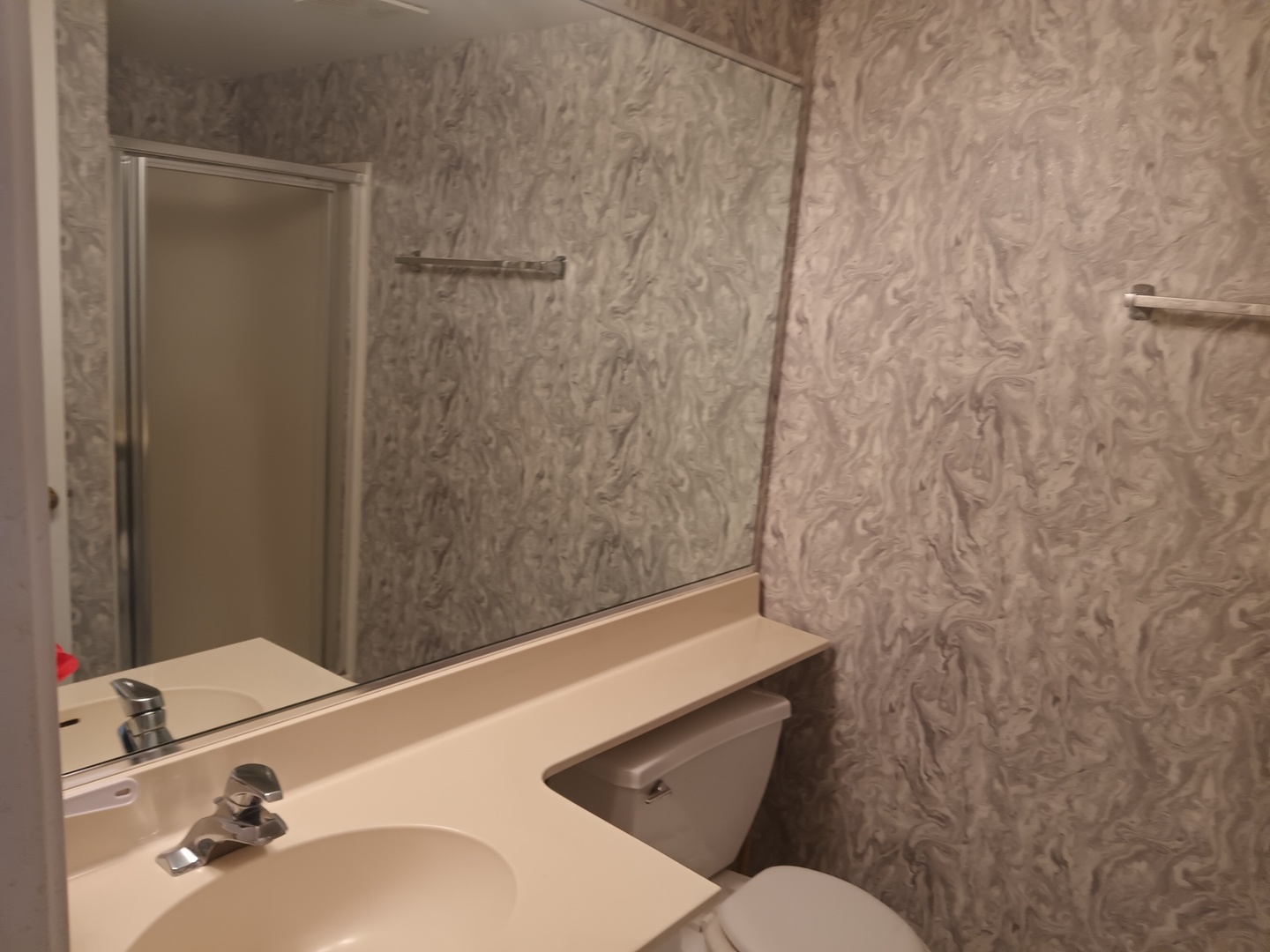 410 Highland Road Matteson, IL 60443 - Photo 19 of 27 a bathroom with a sink and a mirror