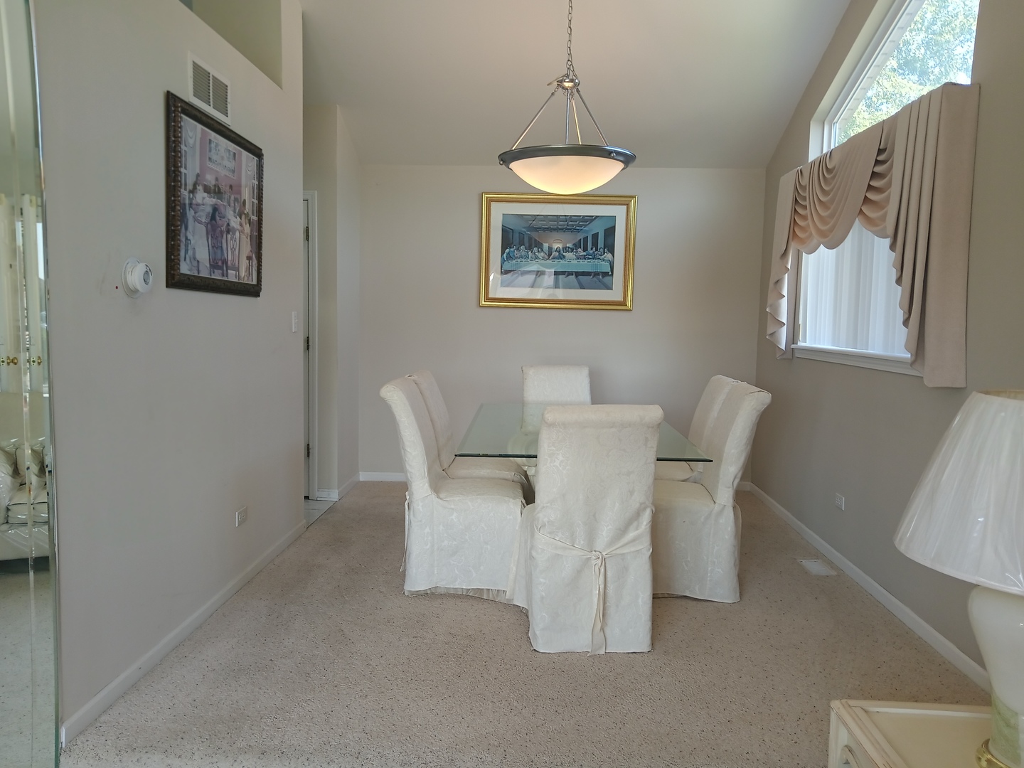 410 Highland Road Matteson, IL 60443 - Photo 6 of 27 a view of a dining room with furniture and window