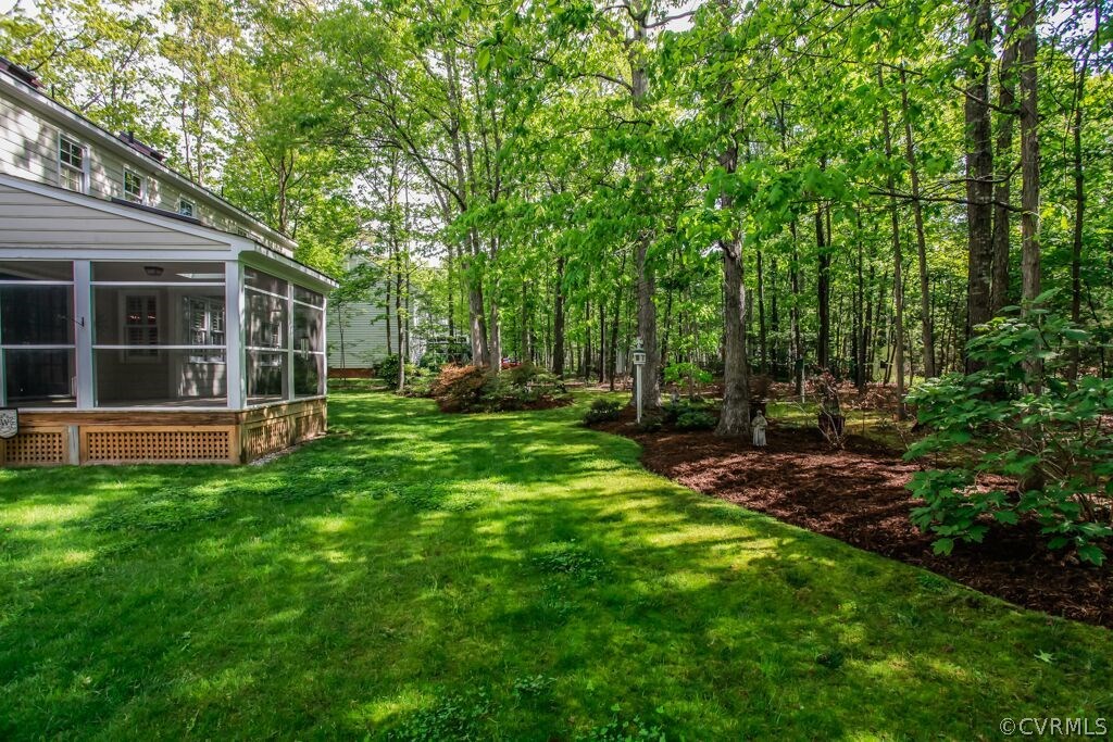 2321 Corner Rock Road Midlothian, VA 23113 - Photo 23 of 25 a view of a house with backyard and sitting area