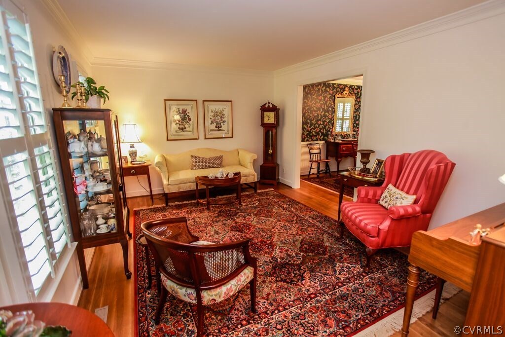 2321 Corner Rock Road Midlothian, VA 23113 - Photo 3 of 25 a living room with furniture and a fireplace