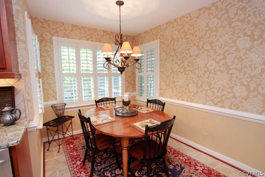 2321 Corner Rock Road Midlothian, VA 23113 - Photo 8 of 25 a view of a dining room with furniture window and outside view