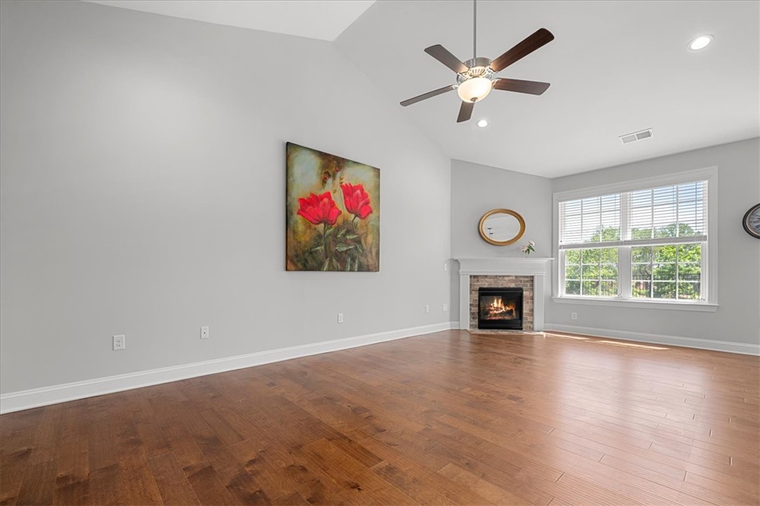 21 Barron Glenn Way Anderson, SC 29621 - Photo 14 of 48 This living room features vaulted ceilings, a large space that could be designed for multiple furniture placement options.