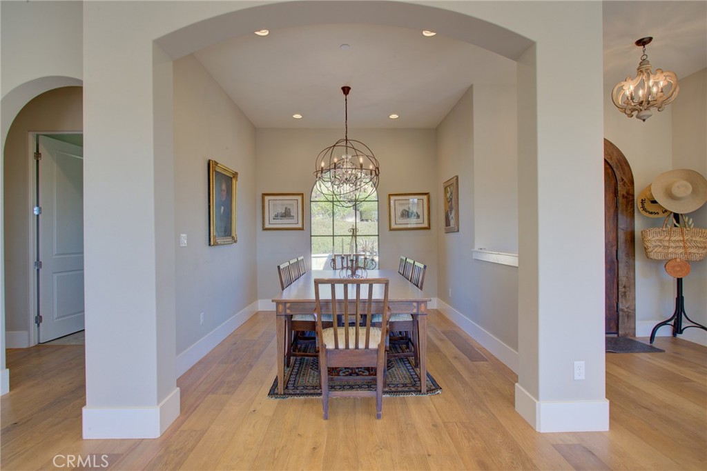 250 Mission Springs Road Arroyo Grande, CA 93420 - Photo 23 of 73 a view of a dining room with furniture window and wooden floor