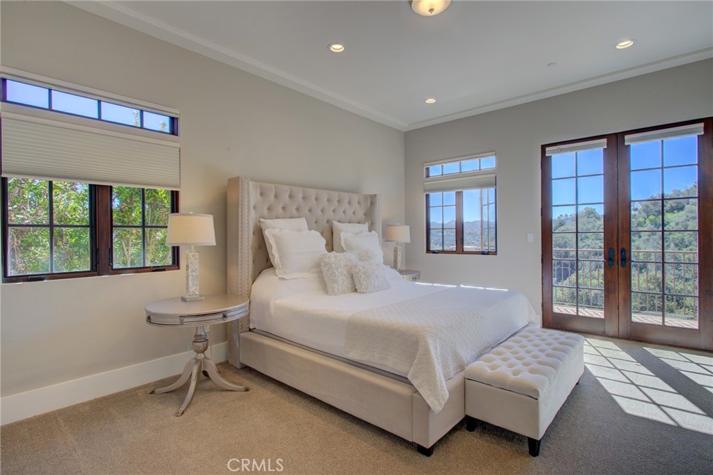 250 Mission Springs Road Arroyo Grande, CA 93420 - Photo 25 of 73 a bedroom with a bed and a large window