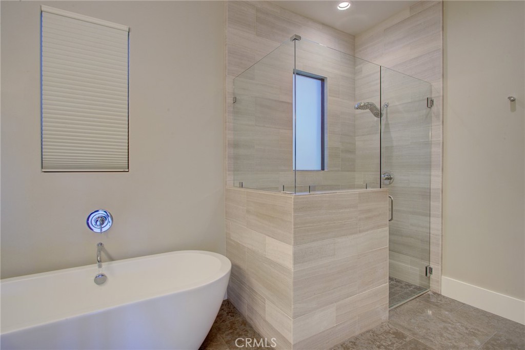 250 Mission Springs Road Arroyo Grande, CA 93420 - Photo 33 of 73 a bathroom with a tub and shower