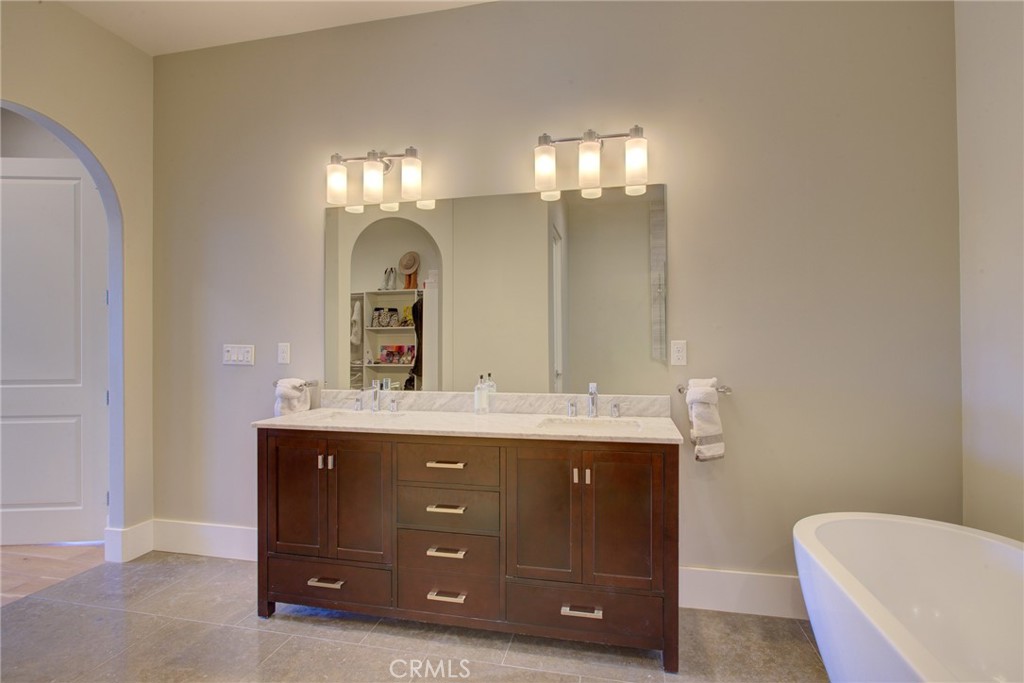 250 Mission Springs Road Arroyo Grande, CA 93420 - Photo 34 of 73 a bathroom with a toilet sink and mirror